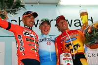 v.l.n.r. Fortunato Baliani(2.), Fabian Wegmann (1.), J�rg Ludewig (3.) bei der Siegerehrung
GP Schwarzwald 2005
[� by J�rgen Burkhardt, B�renhofstra�e 25, 70771 Leinfelden-Echterdingen. Telefon 0711/791424, Fax 0711/791437.Postbank Stuttgart(BLZ 600 100 70) Konto 234130-708) www.radsportfoto.de. Bitte zwei Belegexemplare zusenden. Nutzung ist honorarpflichtig gemaess MFM zzgl. 16% MWSt. Drittrechte sind nicht geklaert. NO MODEL RELEASE. Jede Weitergabe dieses Materials an Dritte ohne ausdrueckliche Genehmigung ist untersagt.]

